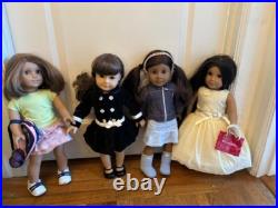 10 Pre-Owned American Girl Dolls with clothes, accessories, and stroller