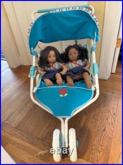 10 Pre-Owned American Girl Dolls with clothes, accessories, and stroller