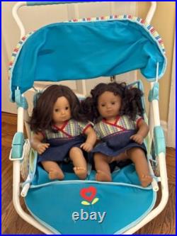 10 Pre-Owned American Girl Dolls with clothes, accessories, and stroller