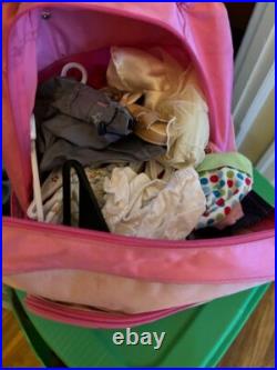 10 Pre-Owned American Girl Dolls with clothes, accessories, and stroller