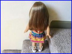 Perfect condition used American Girl doll. Doll #65 blue eyes reddish hair