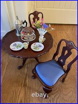 Retired American Girl/Pleasant Company Felicity withclothes, book, dining set